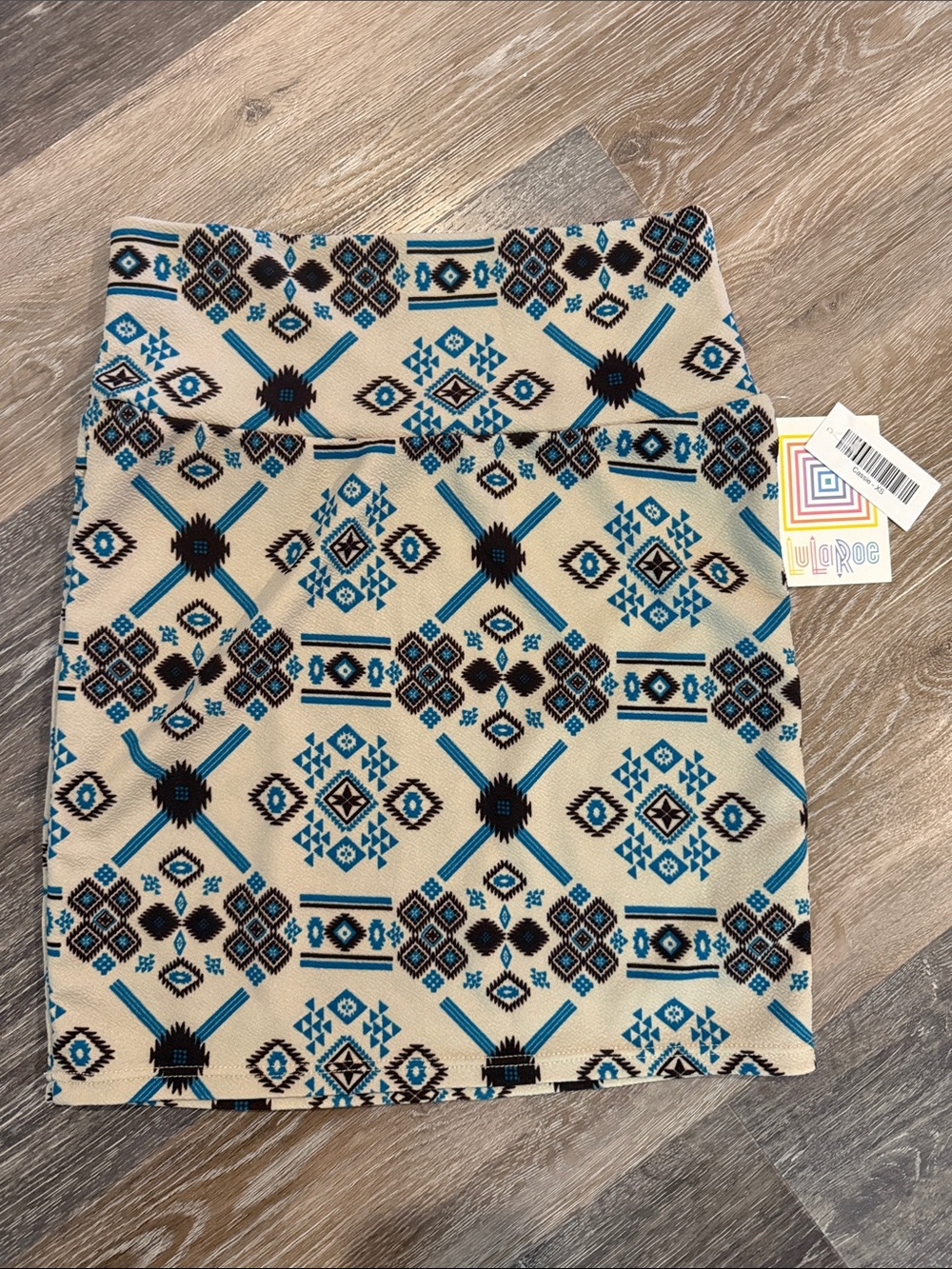 LuLaRoe Beige Mini Skirt with Blue and Black Aztec Print